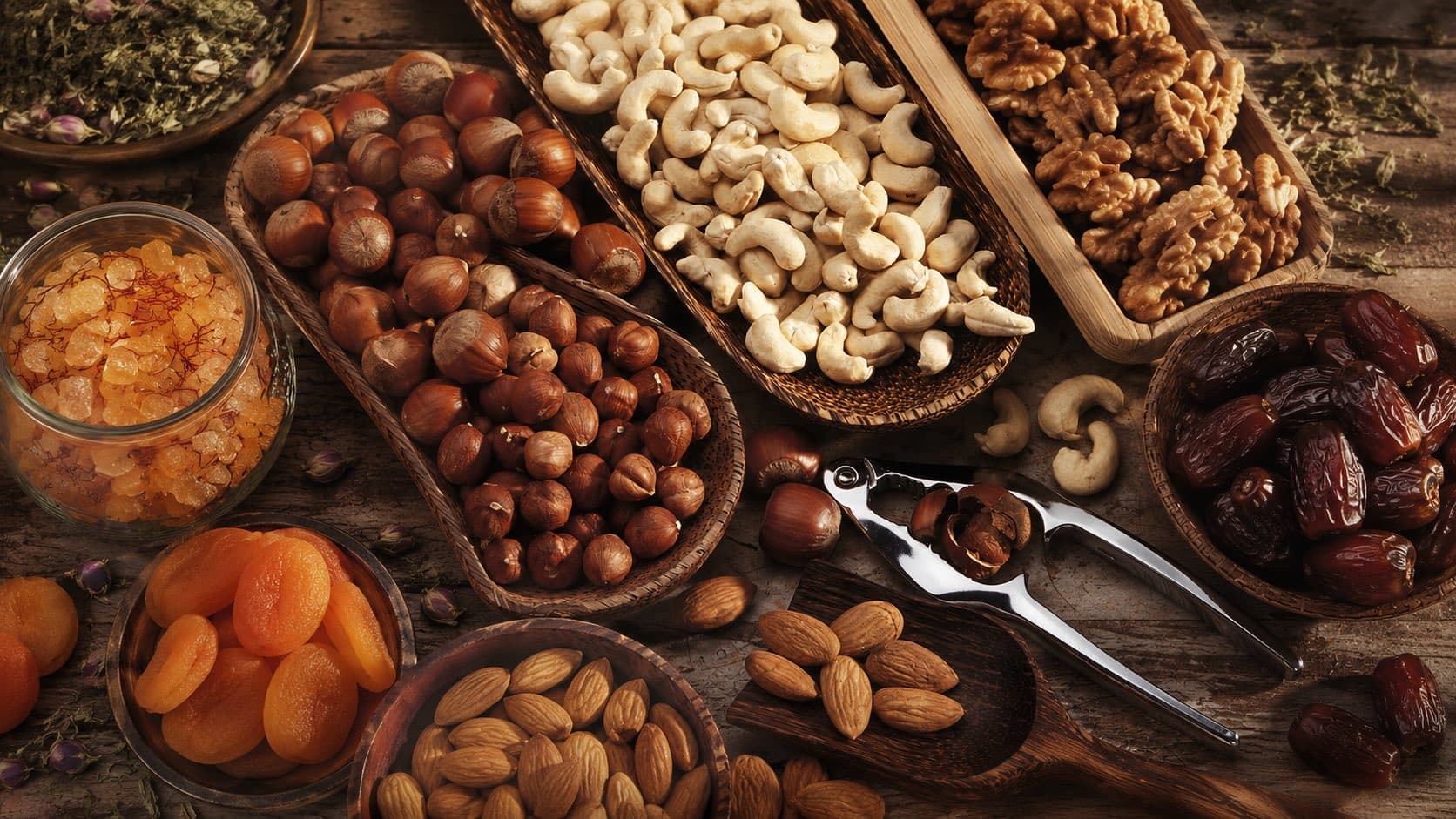 Anjoman's full pantry range: mixed nuts, dried fruit and dates, ready for wholesale